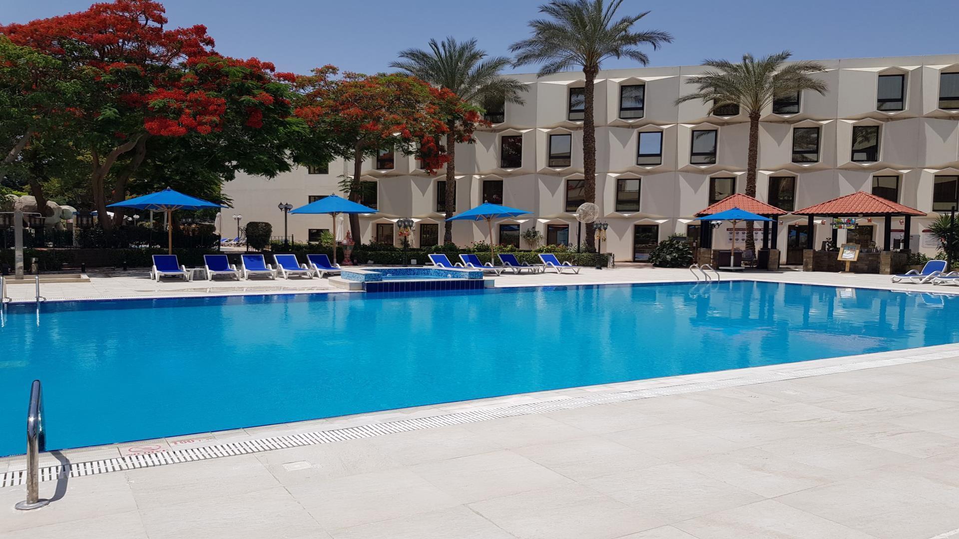 Le Passage Cairo Hotel & Casino Dış mekan fotoğraf The pool at the Hilton Taba